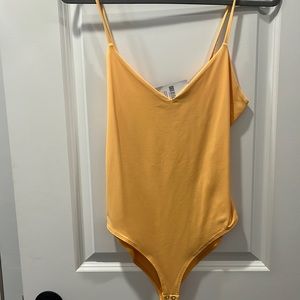 NWT Forever 21 yellow smoothing spandex bodysuit // size M